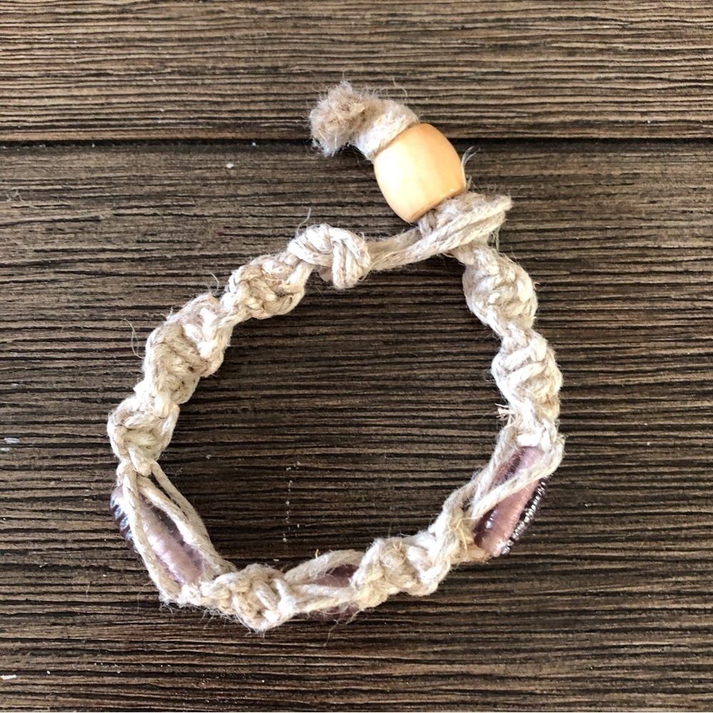 Handmade hemp and purple glass beads bracelet